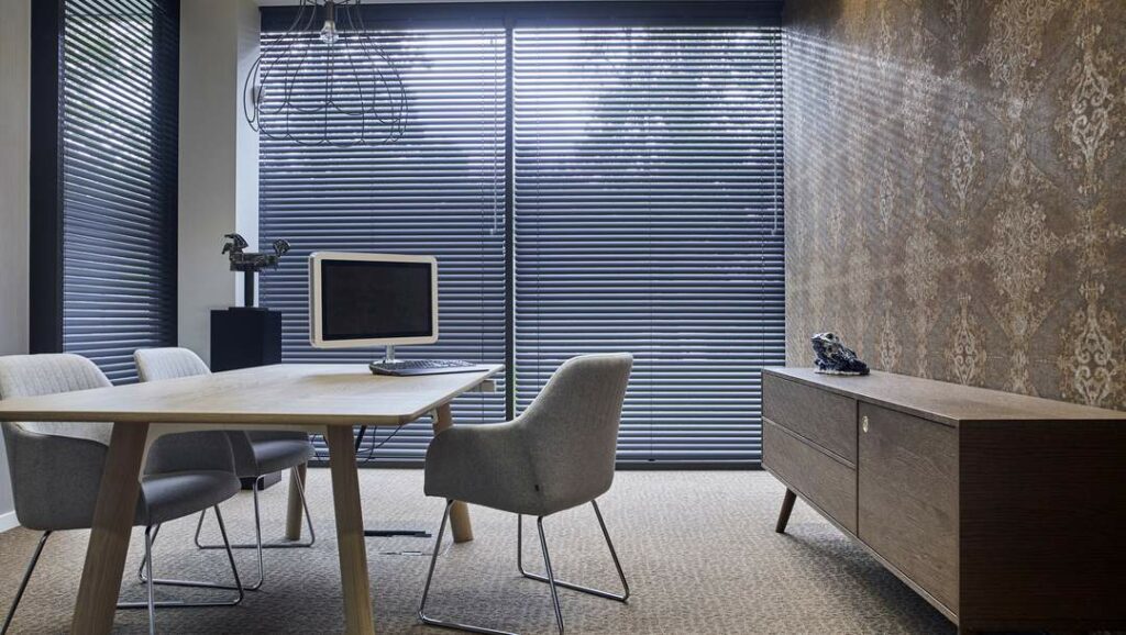 Stylish home office space featuring Blue Venetian Blinds available at Complete Blinds Showroom.