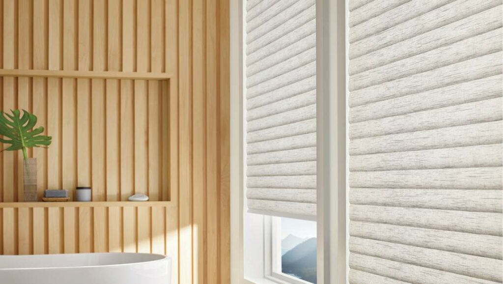 Contemporary wooden zen bathroom featuring Sonnette Shades by Luxaflex, installed by Complete Blinds.