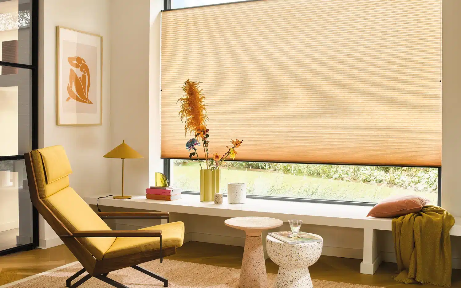 Luxaflex Orange Duette Shades in a modern and contemporary living room.