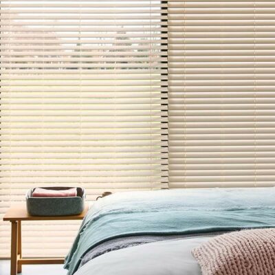 Cozy Bed Room With Large Windows And Natural Light Featuring Timber Blinds By Luxaflex.