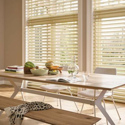 Warm, Modern, And Wooden Living Room Featuring Yellow Venetian Blinds By Luxaflex, Available At Complete Blinds Showroom.