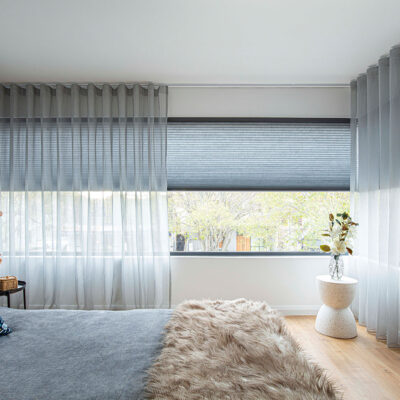 Modern Cozy Blue Themed Bedroom Featuring Luxflex Sheer Curtains With Duette Shadings. Shutters With Curtains Combination.