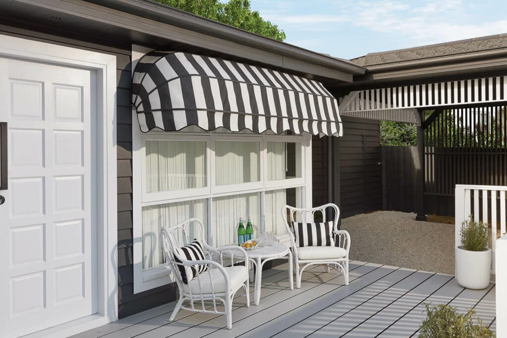 Canopy, stationary style awnings. Vintage black and white pinstripe design, installed at home patio.