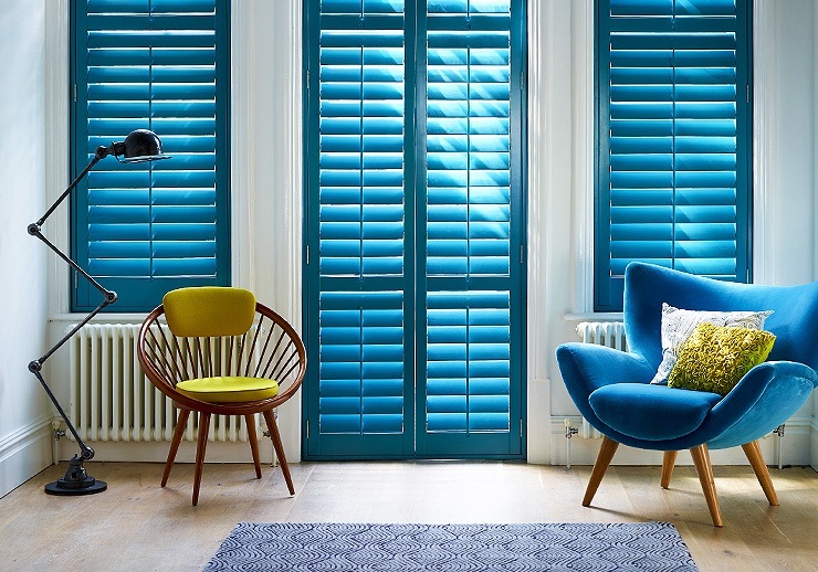 Blue plantation shutters in a modern and contemporary space.