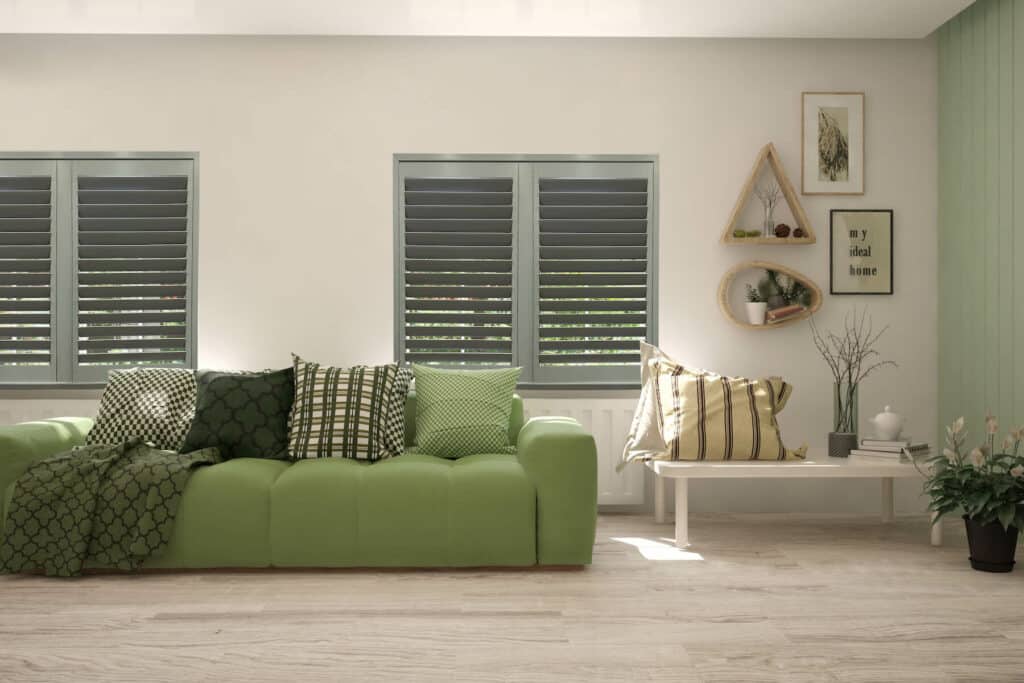 Fog green Plantation Shutters in a modern and contemporary living room. Product available at Complete Blinds showroom. Plantation Shutter Colours.