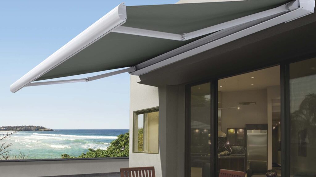 Retractable awning installed at patio. Awnings for small spaces.