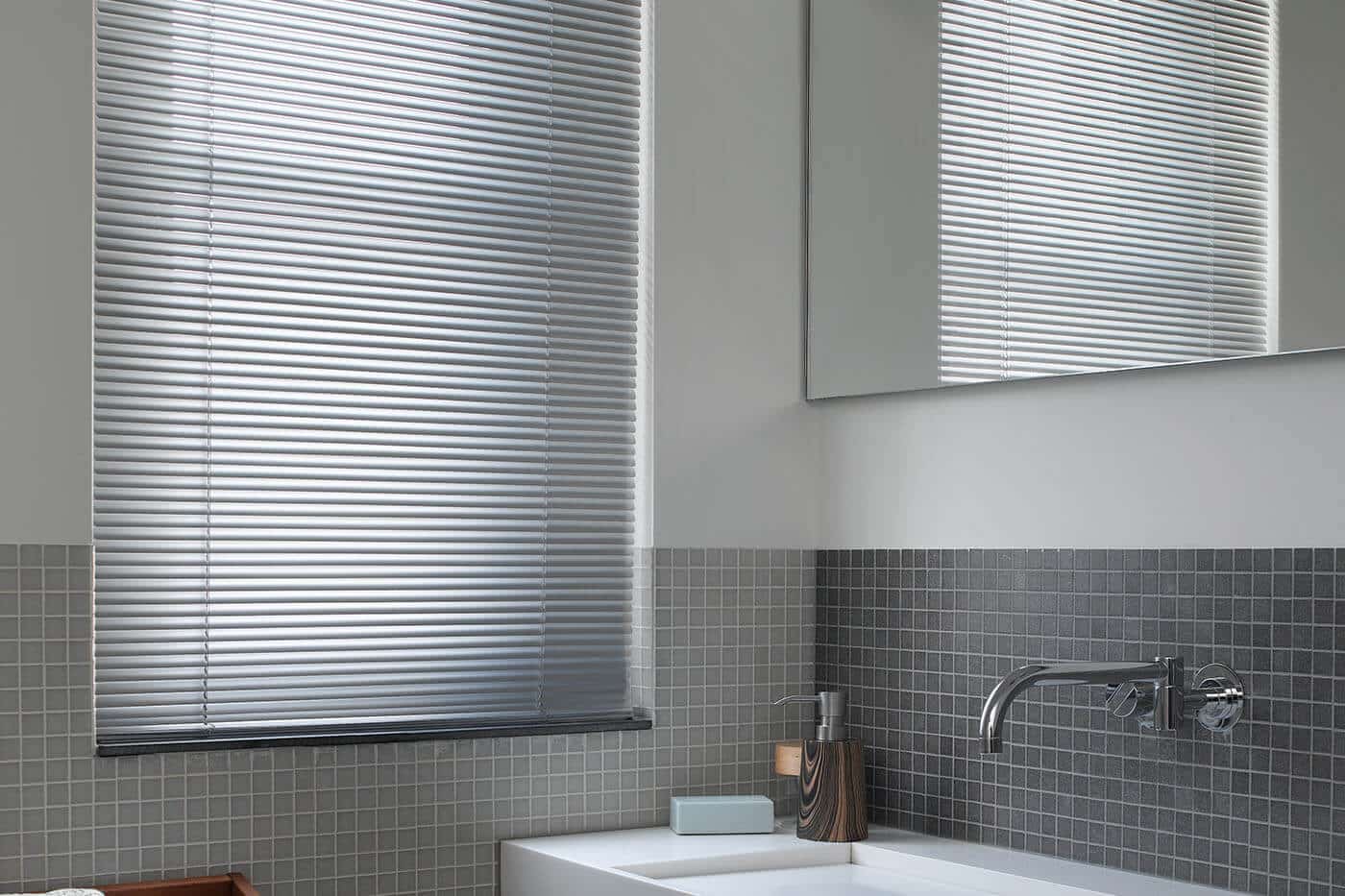 High quality Aluminium Venetian Blinds allowing natural sun light and privacy control in bathroom. Available in different colours and finishes. Modern and elegant design. For sale in our Sydney showroom.