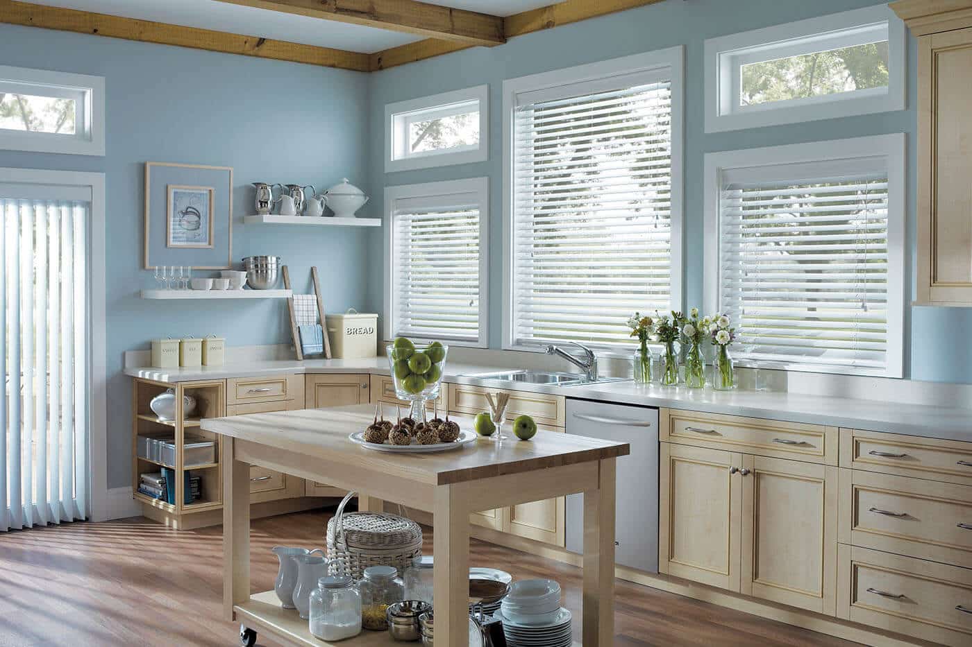 Custom made Timber Venetian Blinds in country woody kitchen. Available in Basswood, Pheonixwood and Western Red Cedar by Luxaflex. Made In Australia.