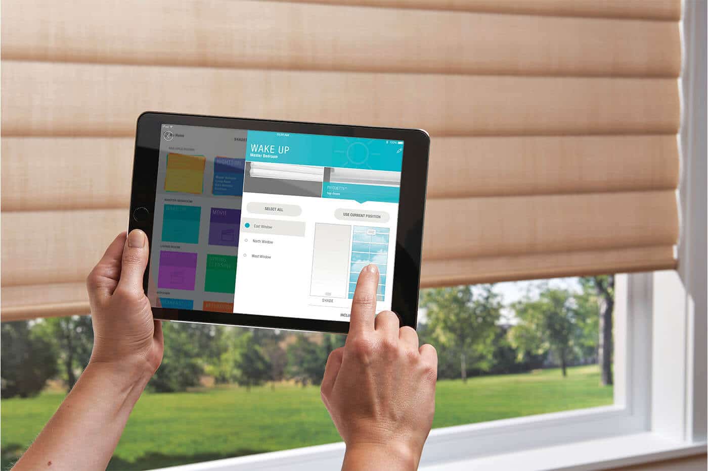 Person using a tablet for Luxaflex service, personalised one-on-one consultatio to design window coverings that best suit a home.