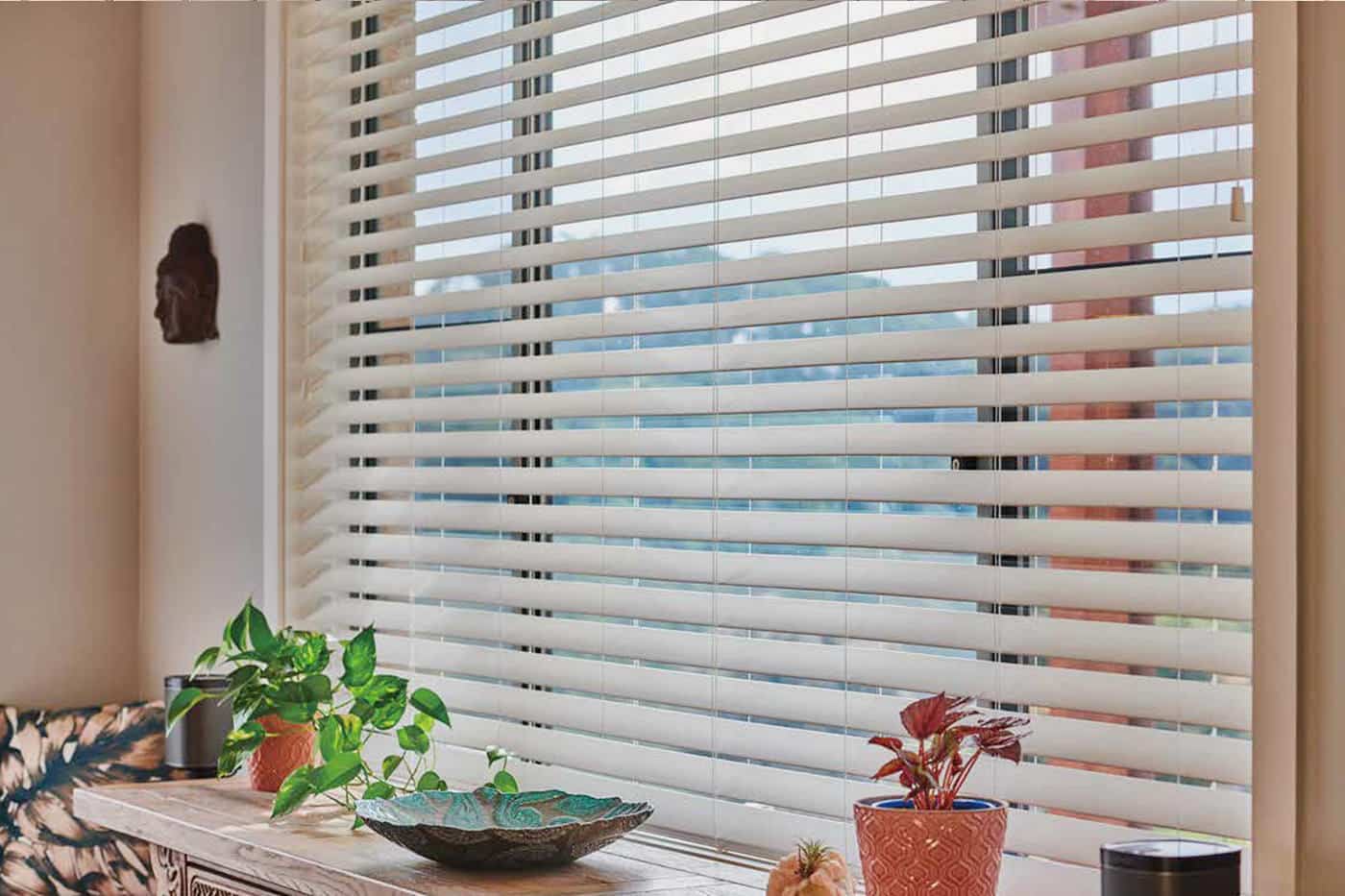 Norman Timber Venetians handcrafted using Phoenixwood, lightweight and durable, with seamless arrangement allowing for greater light and privacy control. Made in Australia. On display in our Sydney showroom.
