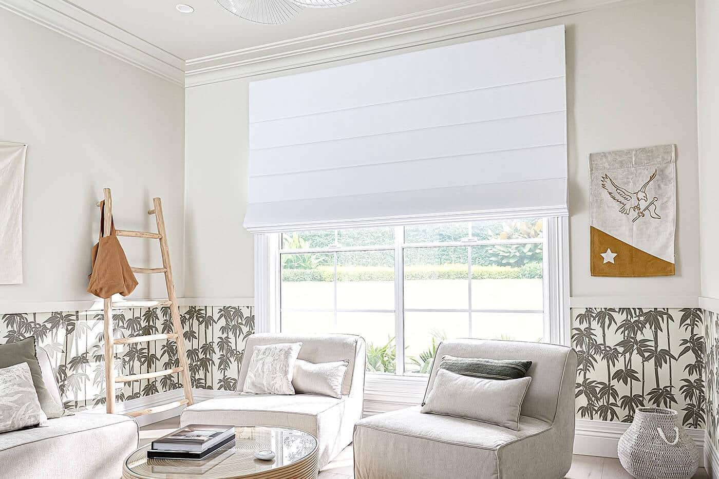 Transitional aesthetic home space with large window panes covered by white Roman Blinds by Luxaflex. Available in various colours and sizes. Made in Australia.