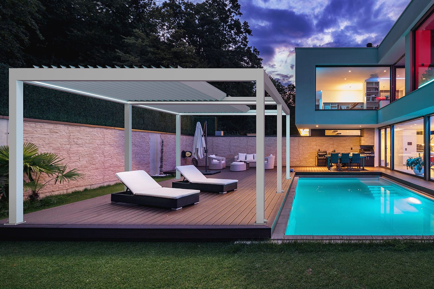 Home pergola with swimming pool installed with Luxaflex Retractable Awnings.