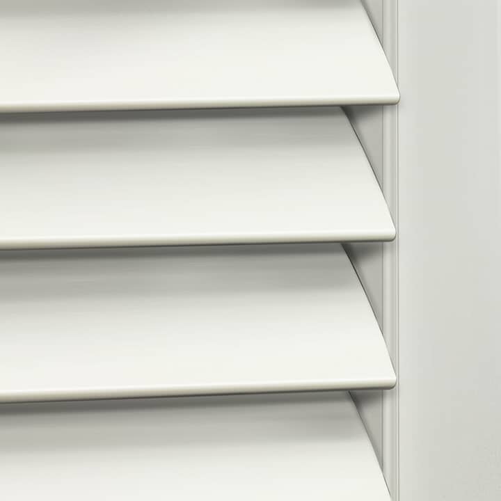 Close-up image of Silk White Woodlore Shutters by Norman. Available at Complete Blinds Sydney.