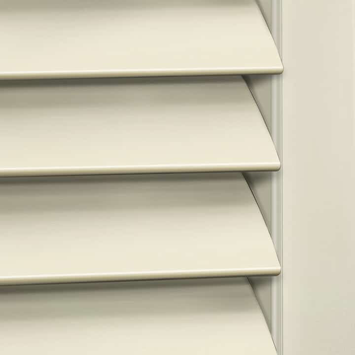 Close-up image of Crisp Linen Woodlore Shutters by Norman. Available at Complete Blinds Sydney.