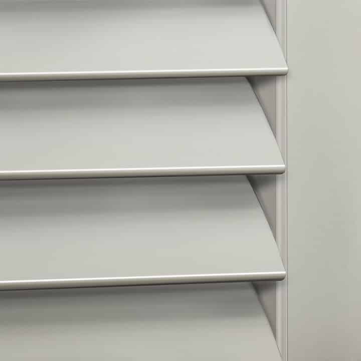 Close-up image of Taupe Gray Woodlore Shutters by Norman. Available at Complete Blinds Sydney.