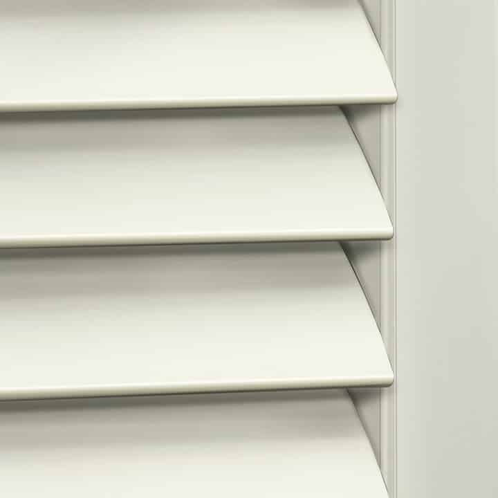 Close-up image of Bright White Woodlore Shutters by Norman. Available at Complete Blinds Sydney.