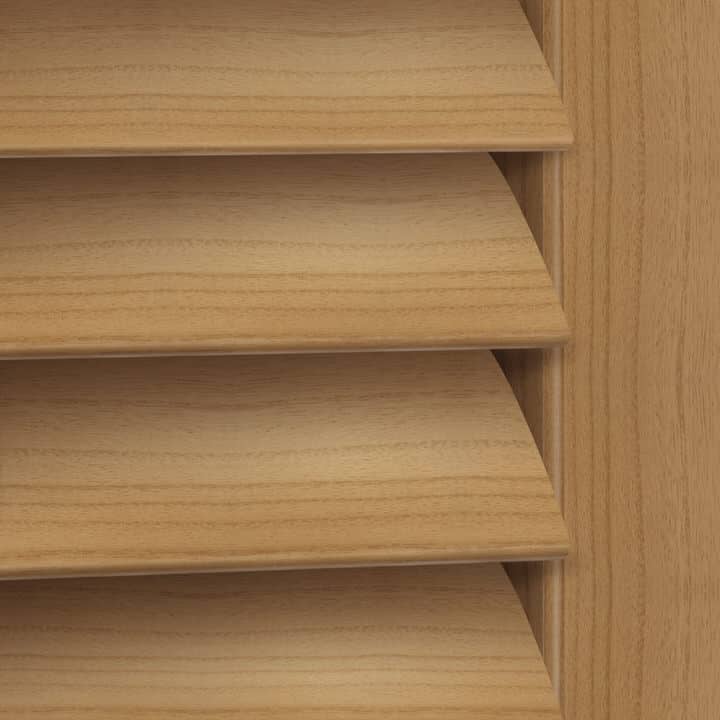 Close-up image of Golden Oak shutters by Norman.