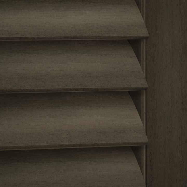 Close-up image of Black Walnut shutters by Norman.