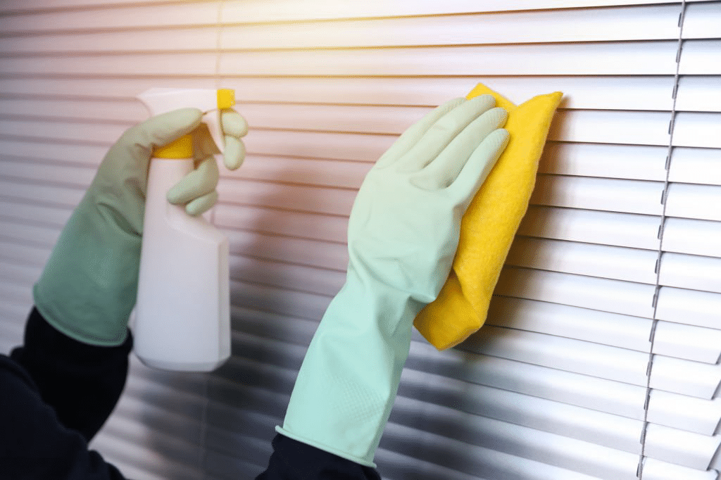 Wiping plantation shutters with moist cloth. Guide on cleaning plantation shutters.